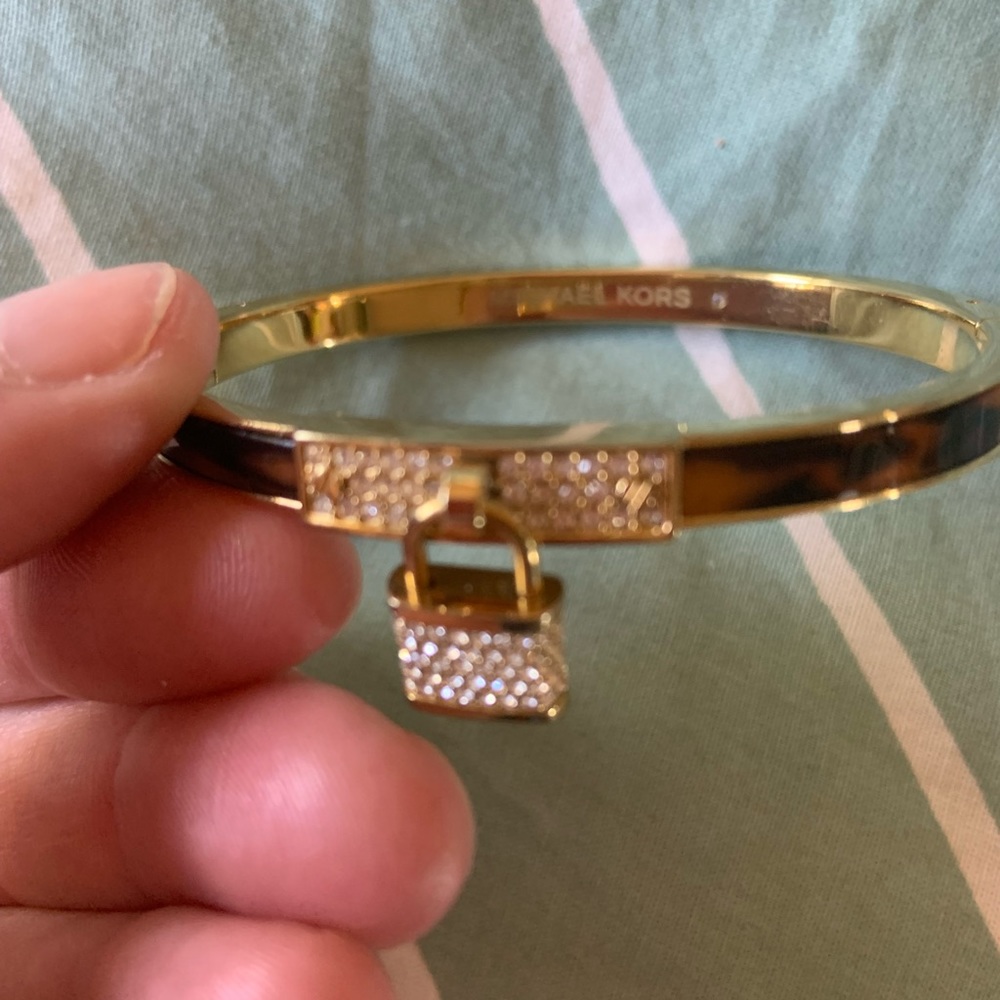 Michael Kohl’s Tortoise and gold Locket bracelet